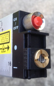 Laser beam selector is pushed down, emitting a line